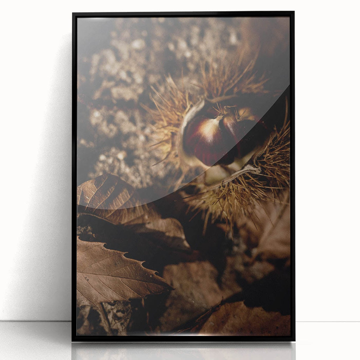 Large abstract wall art featuring autumnal colors on acrylic in a black frame, ideal for modern living room decor.