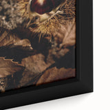 Close-up of a textured, extra-large black wall art featuring colorful abstract shapes on a framed canvas.