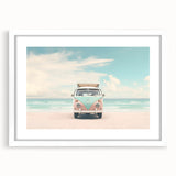 Abstract art print featuring swirling blue and green patterns on a white framed canvas.