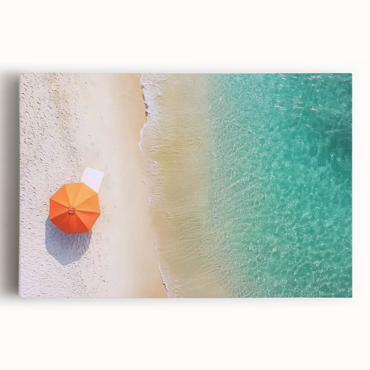 Stretched canvas artwork depicting a serene beach landscape with soft waves and a vibrant sunset, ideal for coastal home decor. Perfect for adding a tranquil ambiance.