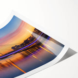 Rolled print of a landscape bridge artwork showcasing vibrant colors and intricate details, elegantly packaged in a protective cardboard tube for safe delivery.