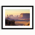 Framed landscape artwork showcasing vibrant canyons in earthy tones, featuring a sleek black mat, perfect for enhancing modern home décor. Ideal for nature enthusiasts.
