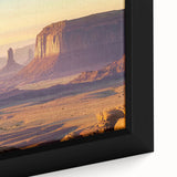 Close-up view of a framed landscape canvas depicting vibrant canyons with rich earthy tones and intricate textures, perfect for home décor enhancement.