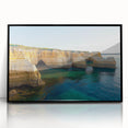 Framed acrylic artwork showcasing a stunning landscape of dramatic cliffs, presented in a sleek black frame, perfect for modern home decor.