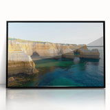 Framed acrylic artwork showcasing a stunning landscape of dramatic cliffs, presented in a sleek black frame, perfect for modern home decor.