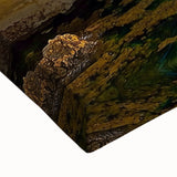 Close-up of a stretched canvas artwork depicting dramatic cliffs and landscapes, showcasing vibrant colors and intricate details, perfect for home decor enhancement.