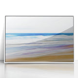 Framed acrylic artwork showcasing a serene beach landscape with vibrant colors and soft waves, set in a sleek white frame, perfect for coastal home decor.