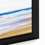 Framed canvas artwork showcasing a vibrant beach landscape with a serene ocean view, featuring soft pastel colors and dynamic waves, perfect for coastal decor.