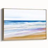 Framed canvas artwork depicting a serene beach landscape with vibrant colors, accented by a gold frame, ideal for enhancing home decor and creating a calming atmosphere.