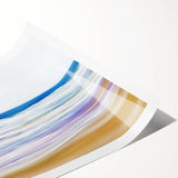 A rolled landscape print showcasing a serene beach scene with golden sands and gently lapping waves, beautifully packaged in a protective cardboard tube for safe transport. Ideal for coastal decor enthusiasts.