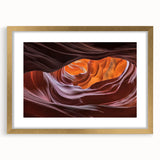Elegant gold-framed landscape art print showcasing vibrant canyons in rich hues, complete with a white mat, perfect for enhancing home décor and adding a touch of nature.