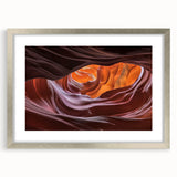 Framed landscape artwork depicting majestic canyons, featuring a silver mat and a sleek design, perfect for enhancing modern home decor and interior aesthetics.