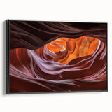 Framed canvas artwork showcasing a stunning landscape of canyons, featuring rich earthy tones and dramatic textures, displayed from a side view against a black frame. Ideal for home decor enthusiasts seeking nature-inspired art.