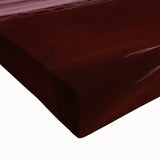 Close-up of a stretched canvas depicting vibrant landscapes of canyons, showcasing rich earthy tones and intricate details, perfect for home decor.