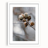 Abstract art print featuring orange and brown autumn leaves on a white framed canvas, ideal for dining room decor.