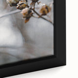 Close-up of a black wall art canvas featuring a textured, colorful abstract design, ideal for living room decor.