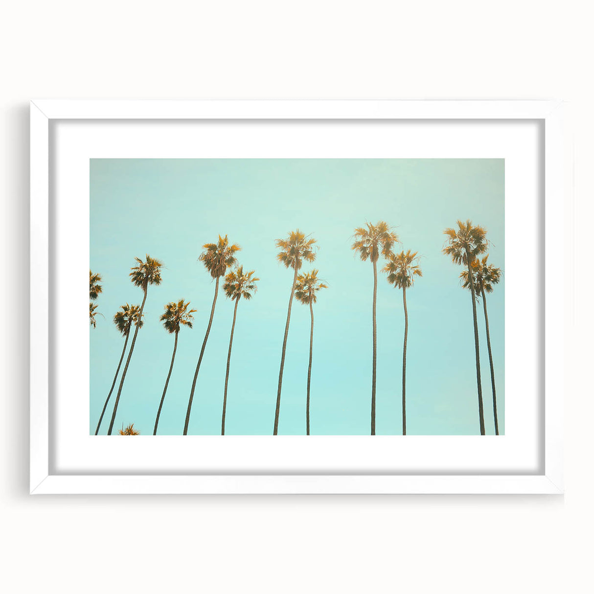 Abstract art print featuring vibrant summer hues on a white framed canvas, ideal for dining room decor.