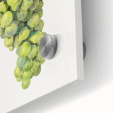 Large abstract wall art featuring assorted fruits in vibrant colors on acrylic glass, ideal for dining room decor.