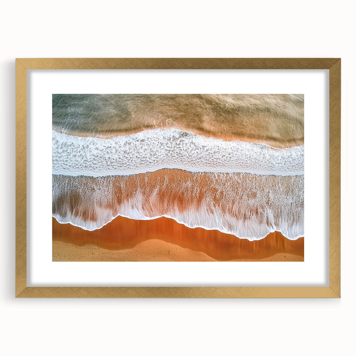Elegant landscape artwork of serene beaches framed in a gold mat, showcasing soft blues and sandy tones, perfect for enhancing modern home decor.