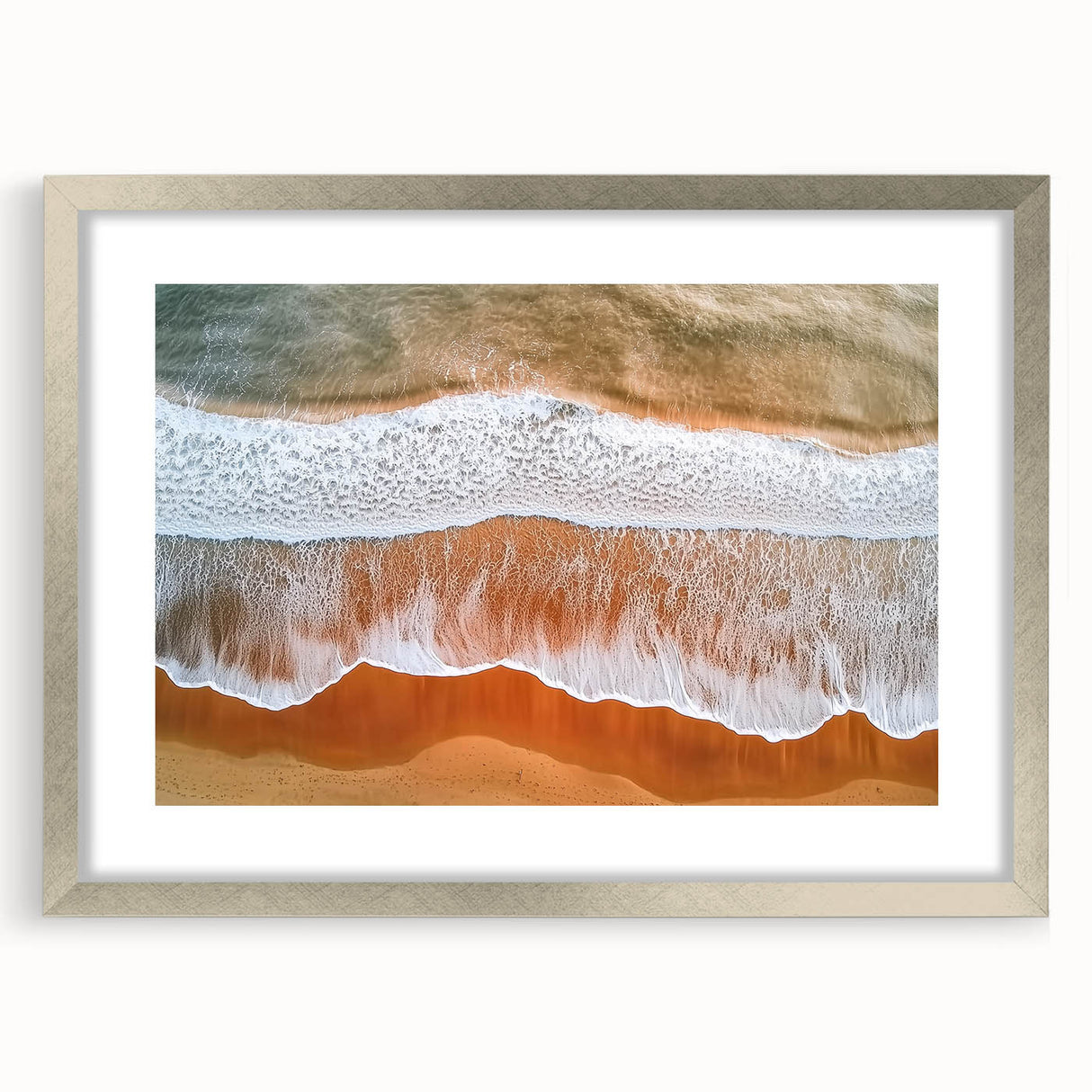 Silver-framed landscape artwork depicting serene beaches, featuring a white mat for an elegant presentation. Perfect for coastal-themed home decor.