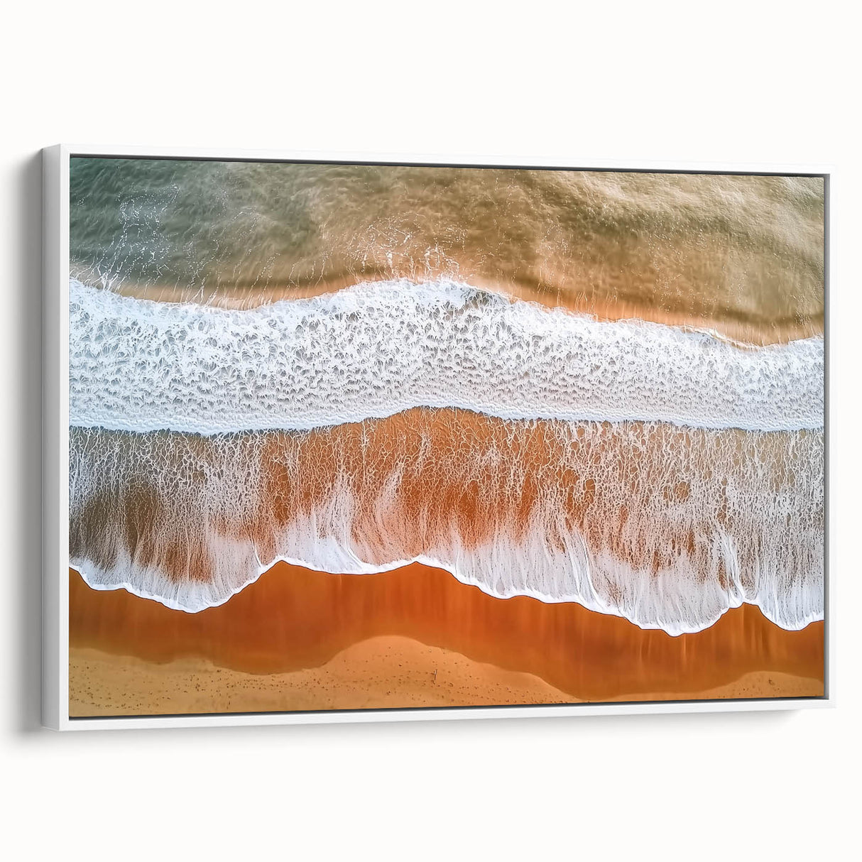 Framed canvas artwork showcasing a serene beach landscape in soft pastel colors, featuring gentle waves and a clear sky, with a crisp white frame enhancing its elegance. Perfect for coastal-themed decor.