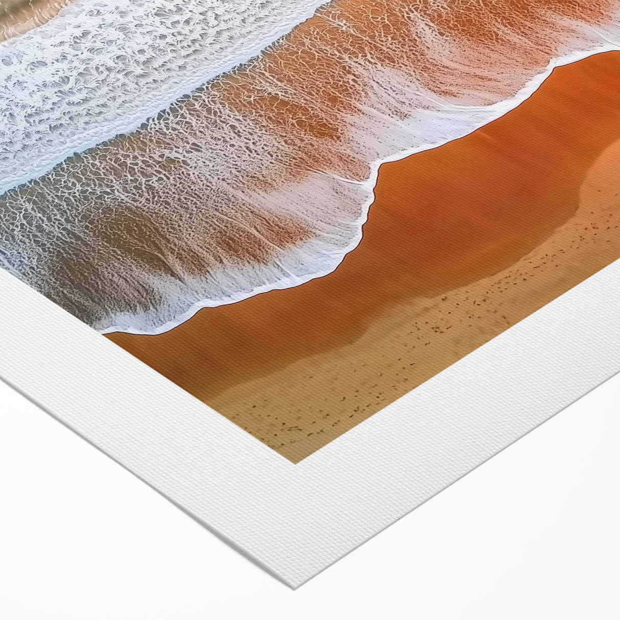 Rolled canvas artwork showcasing a vibrant beach landscape with soft waves and warm golden sands, elegantly packaged in a protective cardboard tube for shipping.