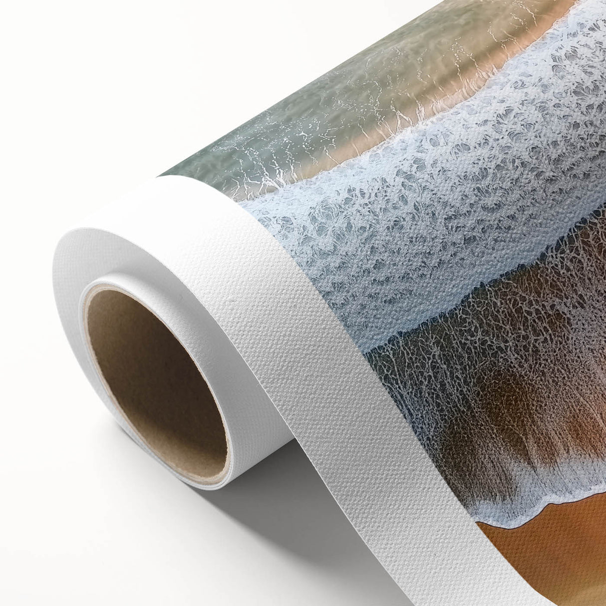 Rolled canvas artwork depicting a serene beach landscape with soft waves and a vibrant sunset, elegantly packaged in a protective cardboard tube for safe delivery.