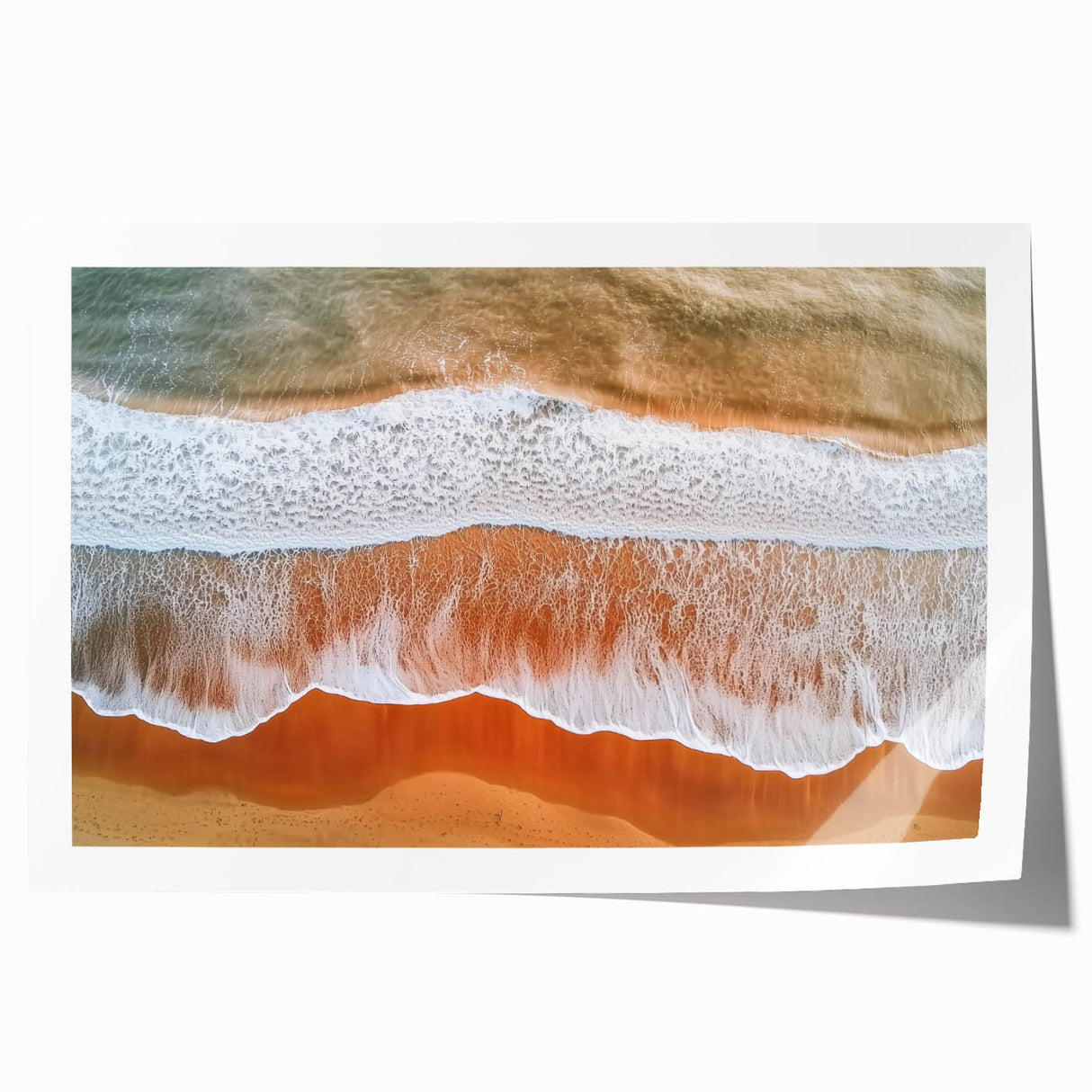 Vibrant landscape print showcasing serene beach scenery with golden sand and turquoise waves, rolled for easy transport and display. Ideal for coastal decor enthusiasts.