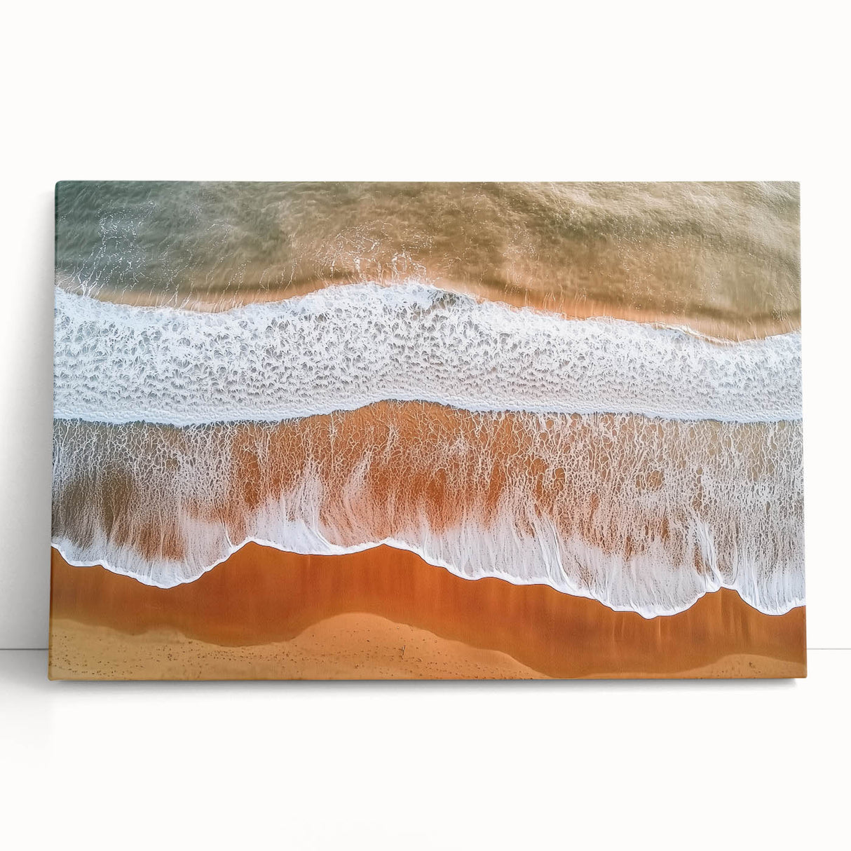 Stretched canvas artwork depicting a serene beach landscape, featuring soft blue skies, golden sands, and gentle waves, ideal for coastal home decor.