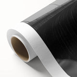 Rolled canvas depicting a serene landscape bridge scene, showcasing vibrant colors and intricate details, packaged securely in a protective cardboard tube for safe shipping.