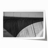 Rolled canvas print showcasing a detailed landscape bridge design, featuring vibrant colors and intricate textures, securely packaged in a protective cardboard tube.