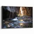Framed landscape canvas print depicting vibrant canyons with rich colors, showcasing a black frame and side view, perfect for home decor or art enthusiasts.