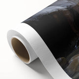 A rolled canvas print showcasing a vibrant landscape of canyons in rich earth tones, expertly wrapped in a protective cardboard tube for safe shipment. Ideal for home decor enthusiasts looking to enhance their space with stunning nature-inspired artwork.