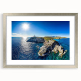 Framed landscape artwork showcasing dramatic cliffs with a silver mat, perfect for enhancing home decor. This piece captures the essence of nature's beauty.