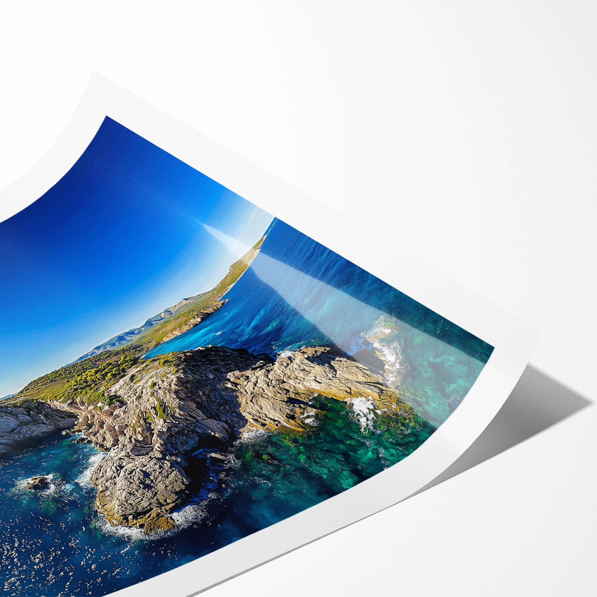 Stunning rolled canvas print showcasing a vibrant coastal landscape with dramatic cliffs and turquoise waters, elegantly packaged in a protective cardboard tube.