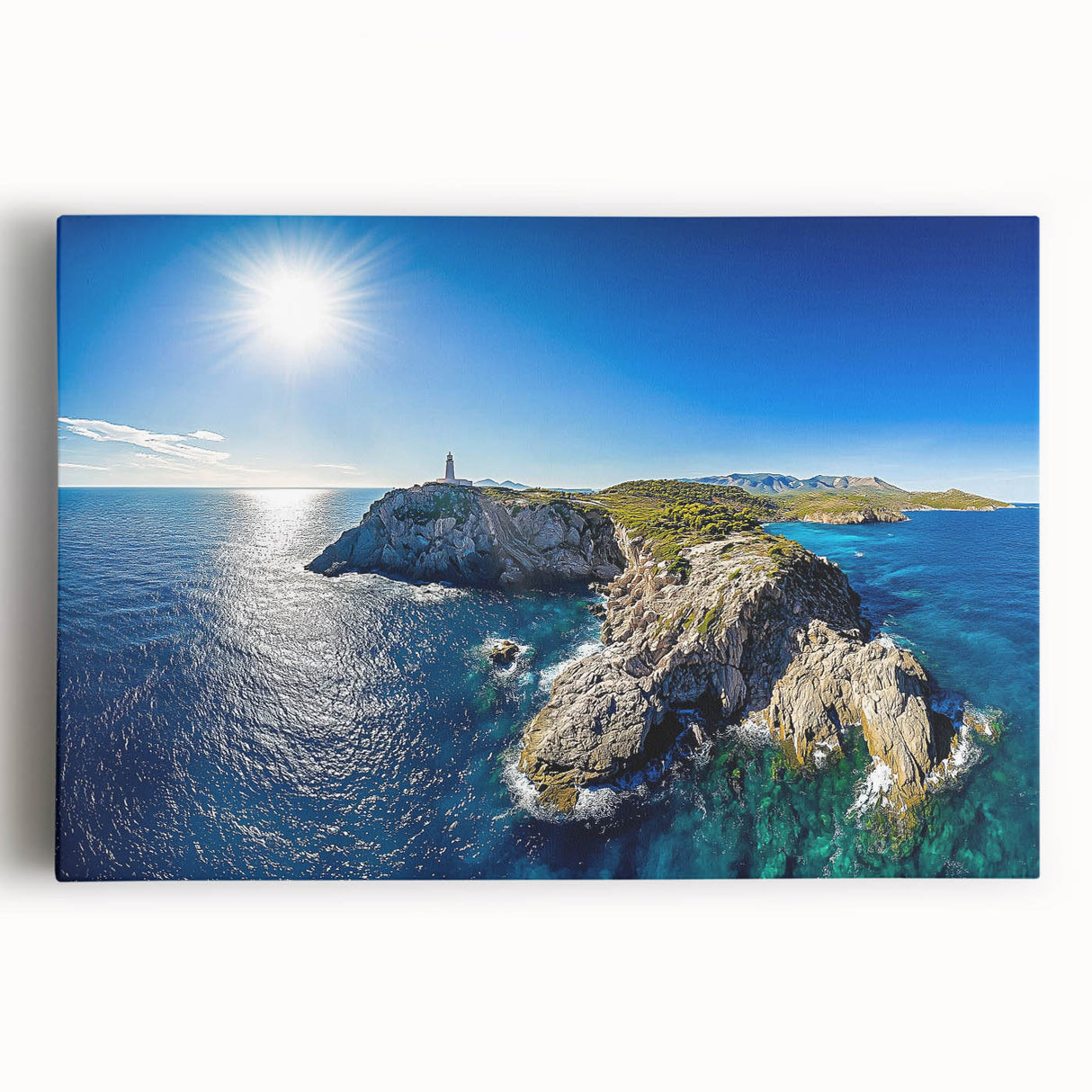 Stretched canvas artwork depicting a dramatic landscape of towering cliffs against a vibrant sunset, perfect for home decor or office enhancement.