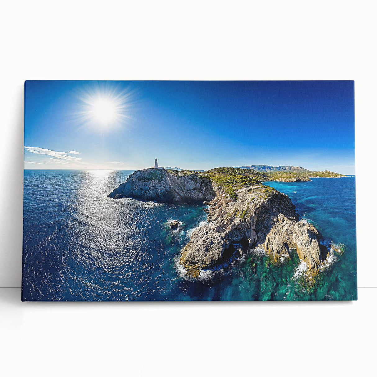 Stretched canvas artwork depicting a serene landscape with dramatic cliffs and a vibrant sunset, perfect for adding a touch of nature-inspired elegance to any room.