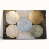 Abstract geometric stretched canvas artwork featuring vibrant colors and sharp angles, leaning against a neutral wall. Ideal for modern home decor.