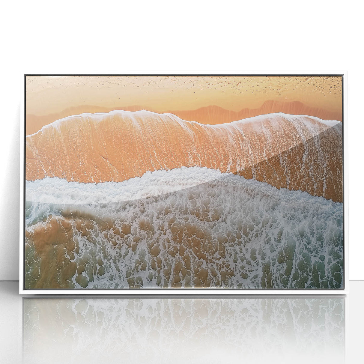 Framed acrylic artwork of a serene beach landscape featuring soft blue skies and golden sand, set in a modern white frame, perfect for home decor.