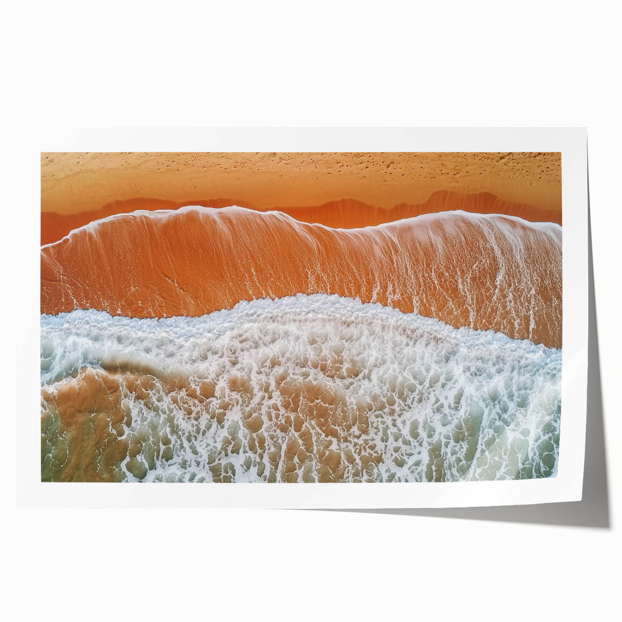 Captivating rolled print of a serene beach landscape, showcasing soft waves and golden sand under a clear blue sky, ideal for home decor and relaxation.