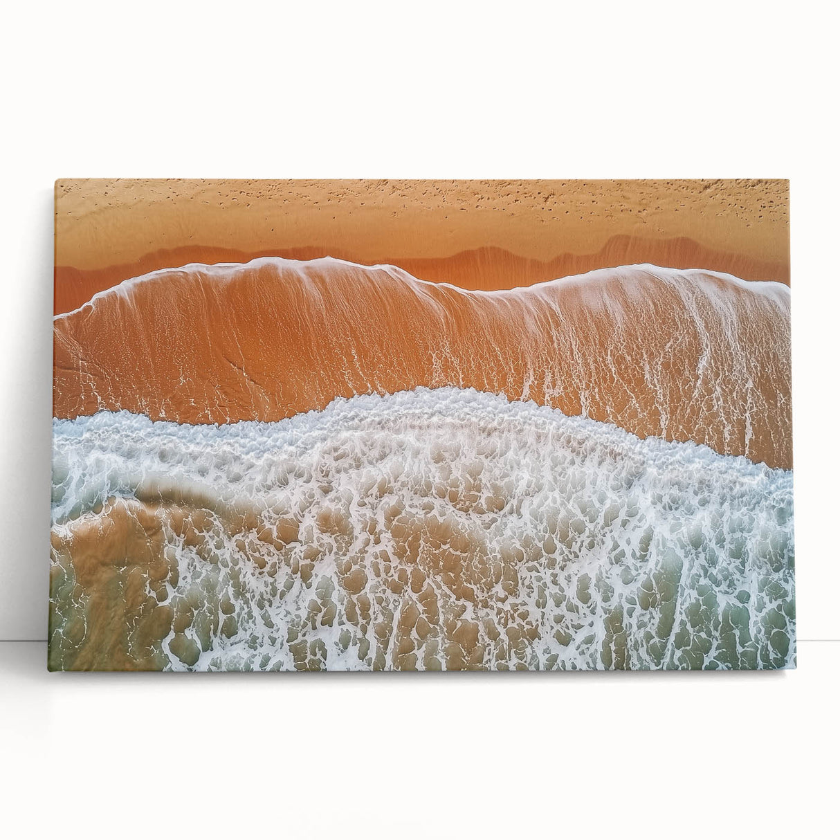 Stretched canvas artwork of a serene beach landscape, showcasing vibrant colors and gentle waves, perfect for coastal decor enthusiasts. Ideal for home or office ambiance.