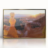 Framed acrylic artwork showcasing a stunning landscape of golden canyons, ideal for enhancing modern interior decor with nature-inspired elegance.