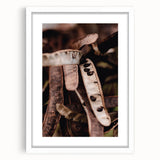 Abstract art print depicting autumnal hues in a minimalist style, framed with a white mat.