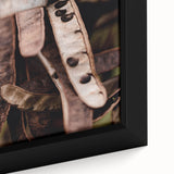 Close-up of a framed canvas depicting a textured fall scene in muted earth tones, ideal for large living room walls.