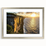 Silver-framed landscape wall art showcasing majestic cliffs, elegantly matted for a sophisticated display. Ideal for modern home decor, adding a touch of nature.