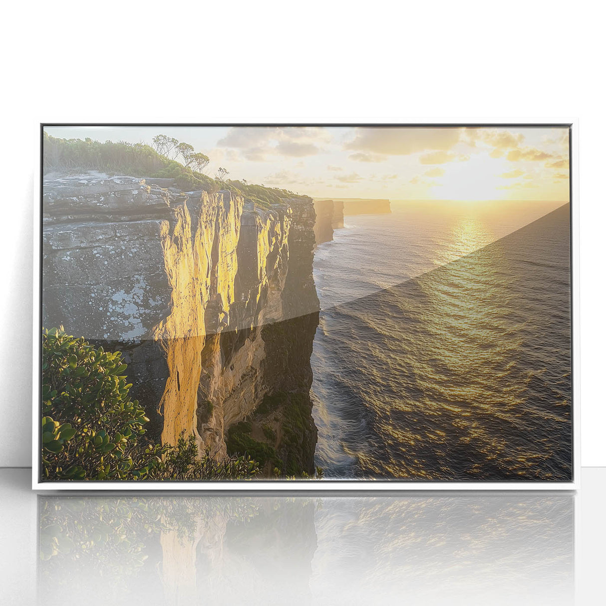 Framed acrylic artwork showcasing a dramatic cliff landscape in vibrant colors, mounted in a sleek white frame, perfect for modern home decor.