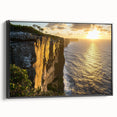 Framed canvas artwork showcasing a dramatic cliff landscape in vibrant colors, featuring a sleek black frame, perfect for modern home decor. Ideal for art enthusiasts.