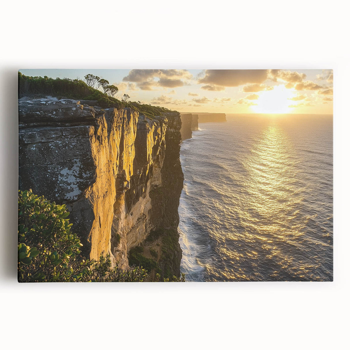 Stretched canvas artwork depicting dramatic cliffs against a vibrant sunset sky, showcasing rich colors and intricate details, perfect for enhancing modern home decor.
