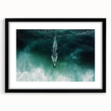 Black-framed landscape artwork showcasing a serene beach scene, featuring vibrant colors and intricate details, perfect for home decor or gallery display.