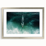 Silver-framed landscape artwork depicting serene beaches, featuring a white mat for contrast, ideal for home decor or beach-themed interiors.